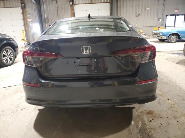 Photo 5 VIN: 2HGFE2F24SH520847 - HONDA CIVIC LX 