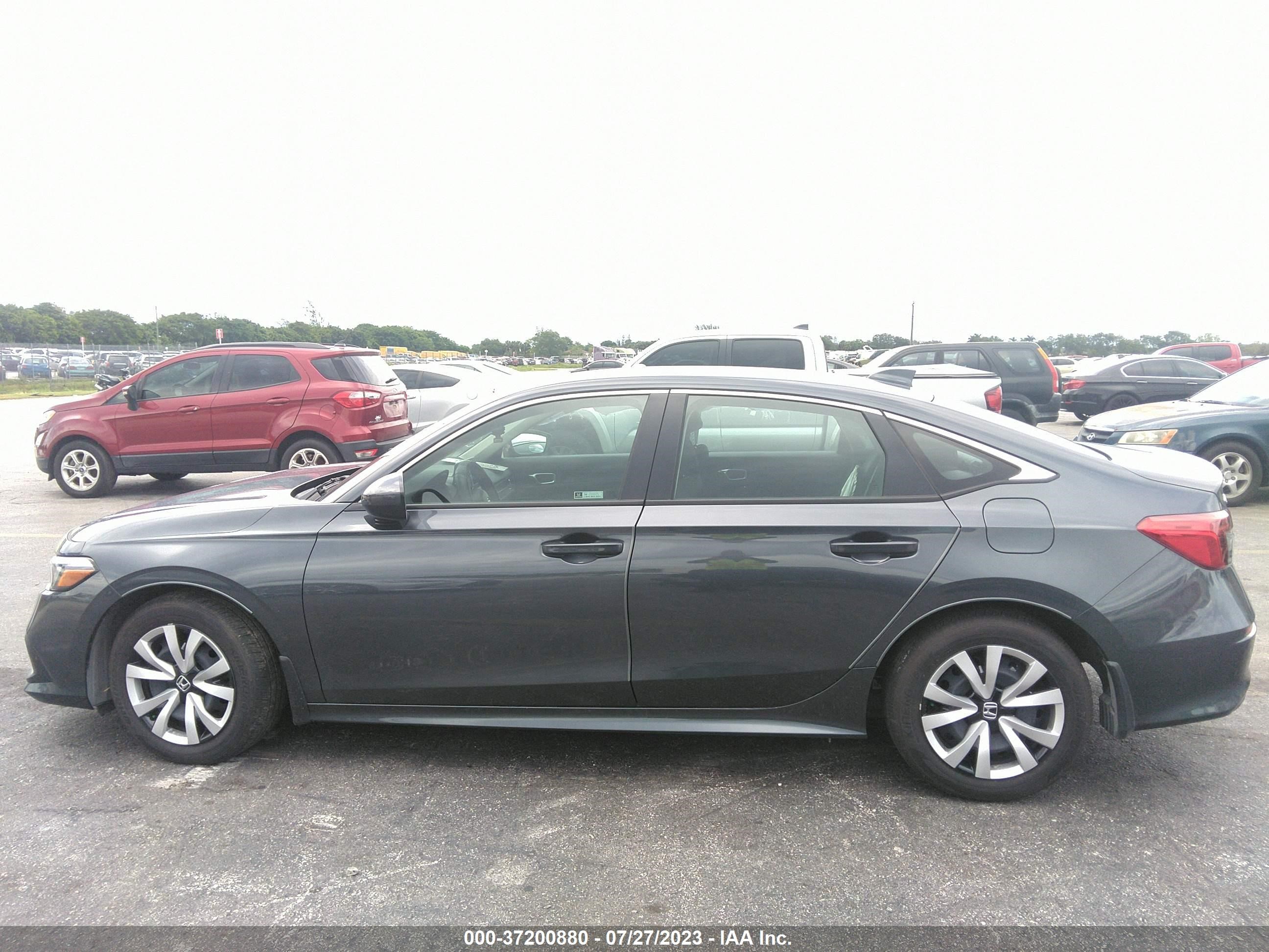 Photo 13 VIN: 2HGFE2F2XPH537725 - HONDA CIVIC 