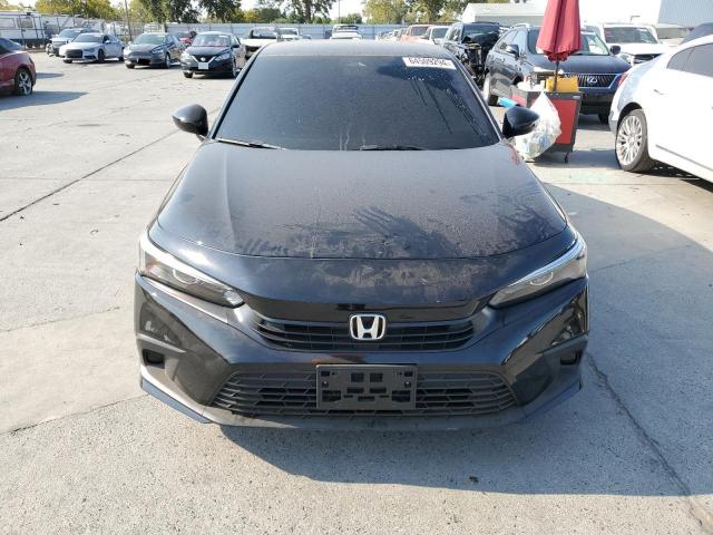 Photo 4 VIN: 2HGFE2F2XRH537971 - HONDA CIVIC LX 