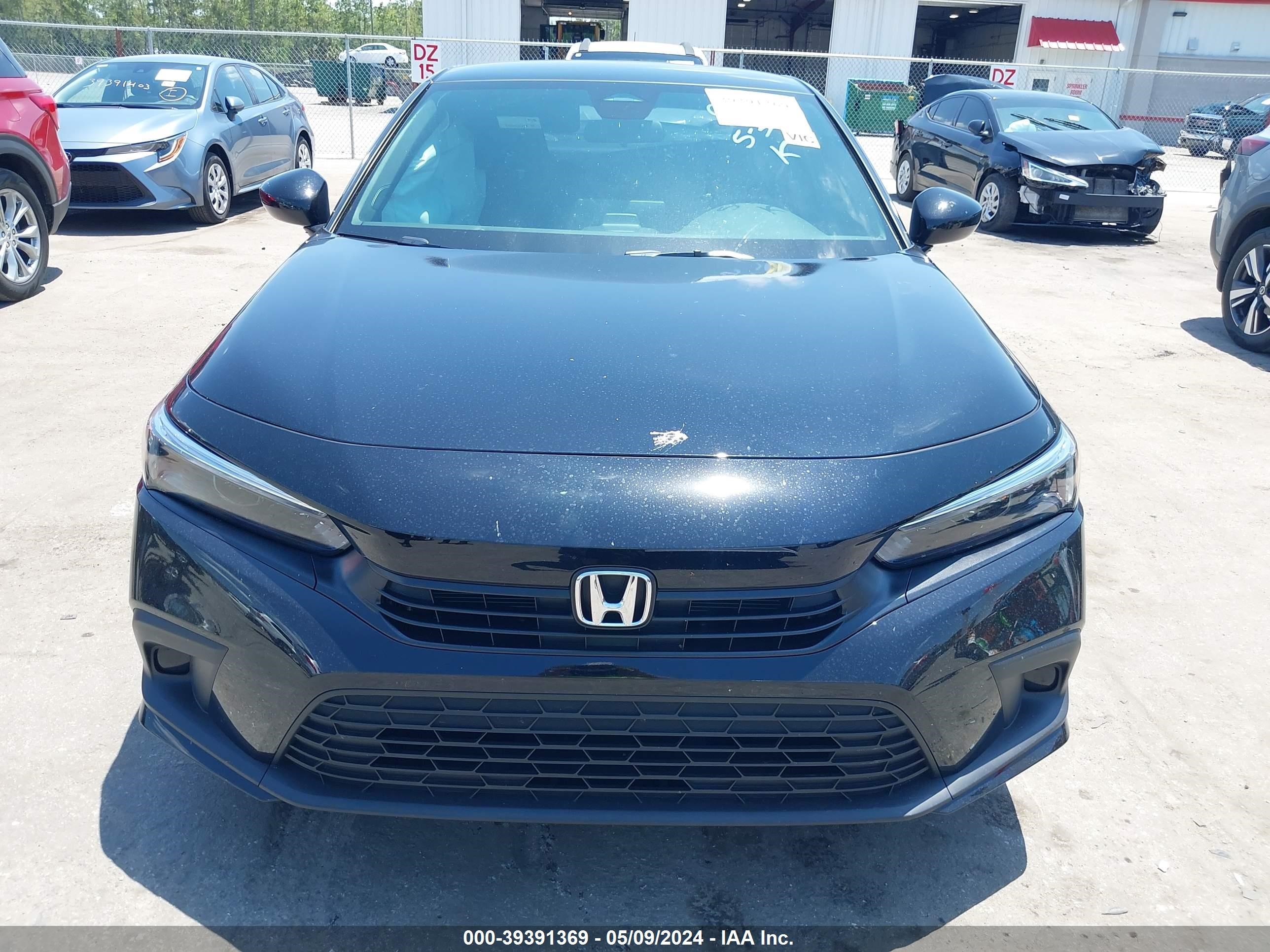 Photo 12 VIN: 2HGFE2F50RH549637 - HONDA CIVIC 