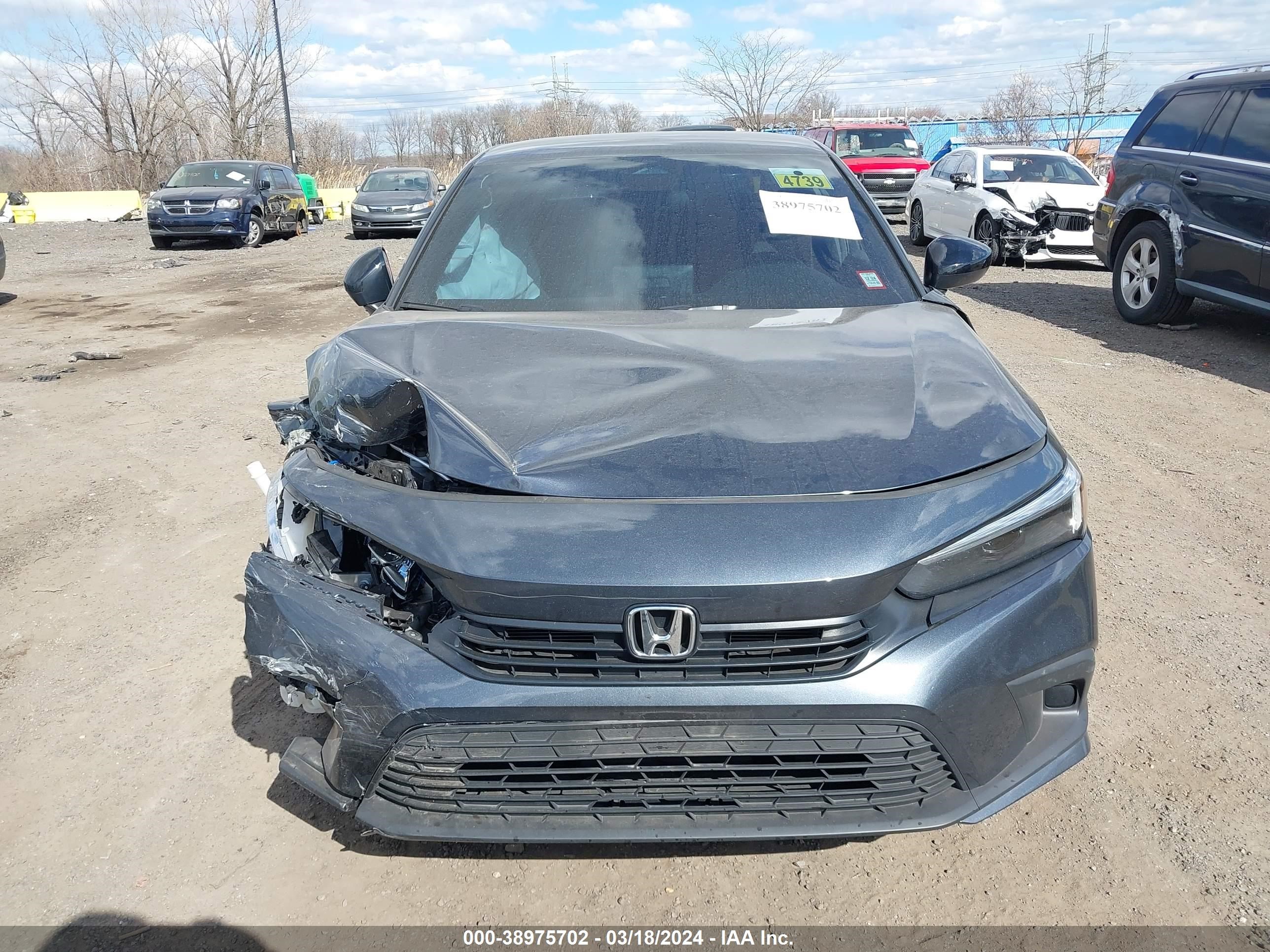 Photo 11 VIN: 2HGFE2F51PH564127 - HONDA CIVIC 