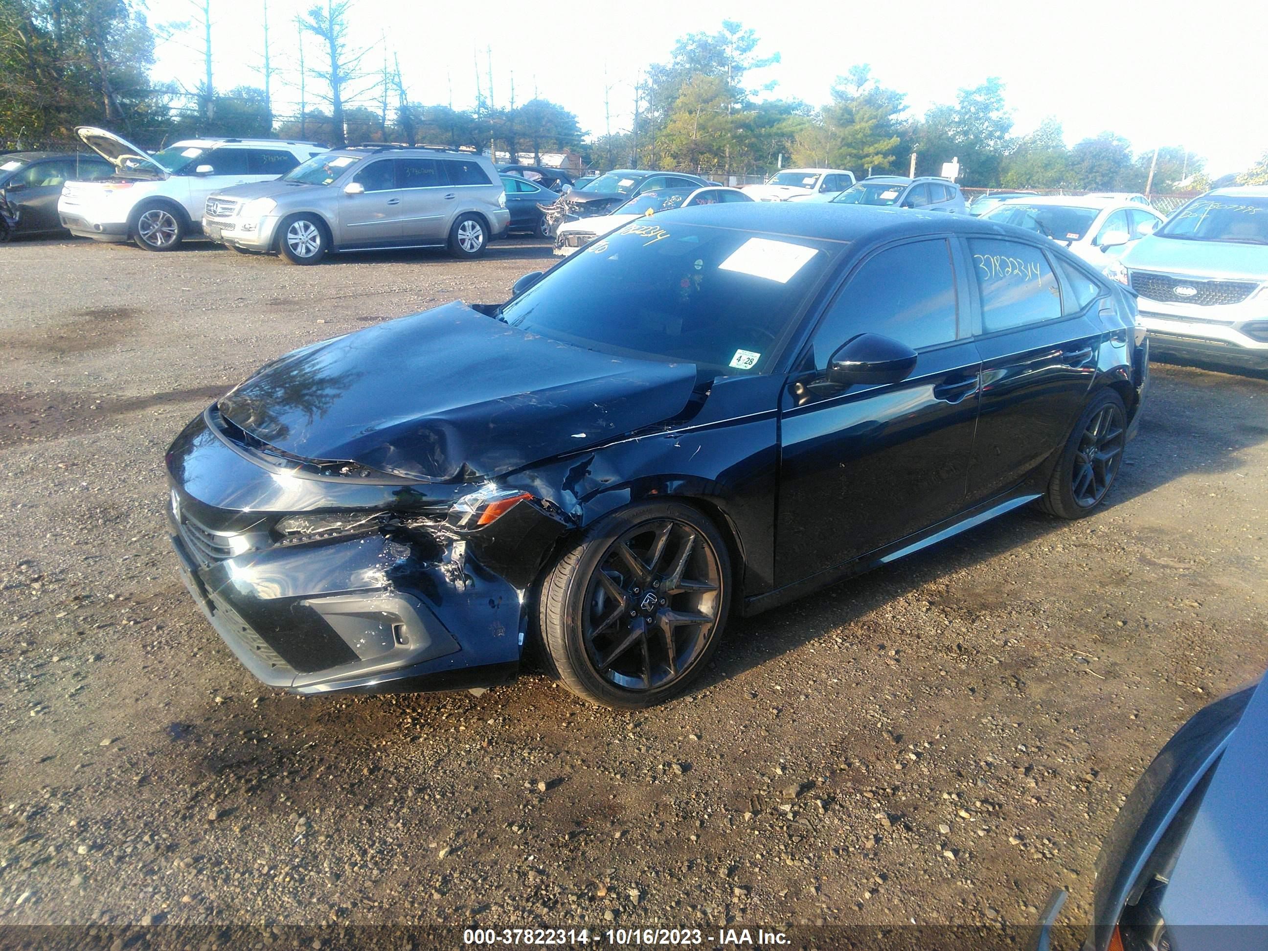 Photo 5 VIN: 2HGFE2F56PH537988 - HONDA CIVIC 