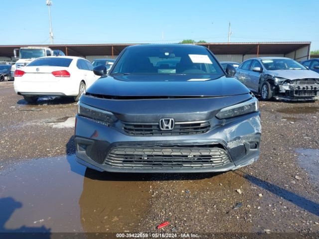 Photo 5 VIN: 2HGFE2F5XPH520353 - HONDA CIVIC 