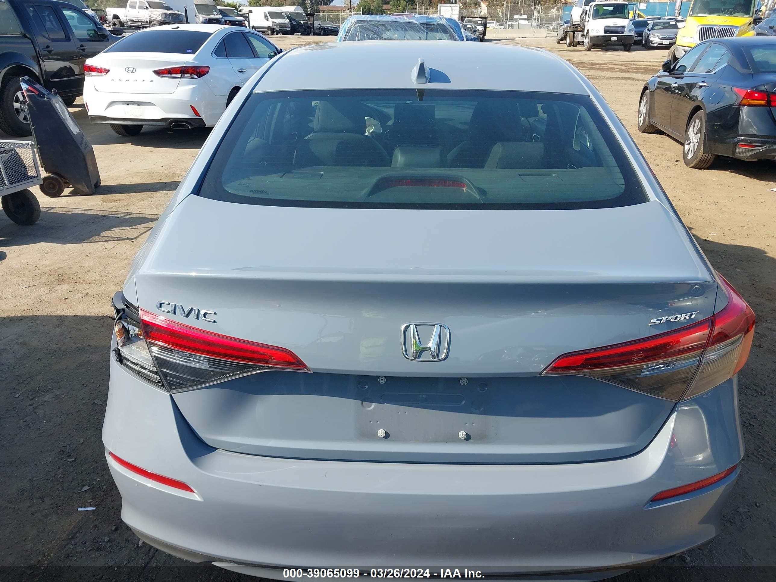 Photo 16 VIN: 2HGFE2F5XPH524225 - HONDA CIVIC 