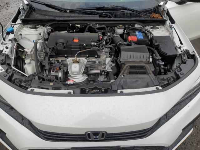 Photo 10 VIN: 2HGFE2F5XPH525049 - HONDA CIVIC 