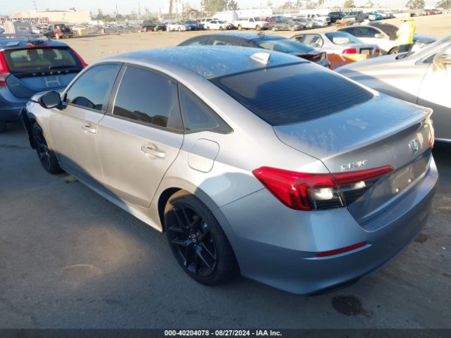 Photo 2 VIN: 2HGFE2F5XPH526217 - HONDA CIVIC 