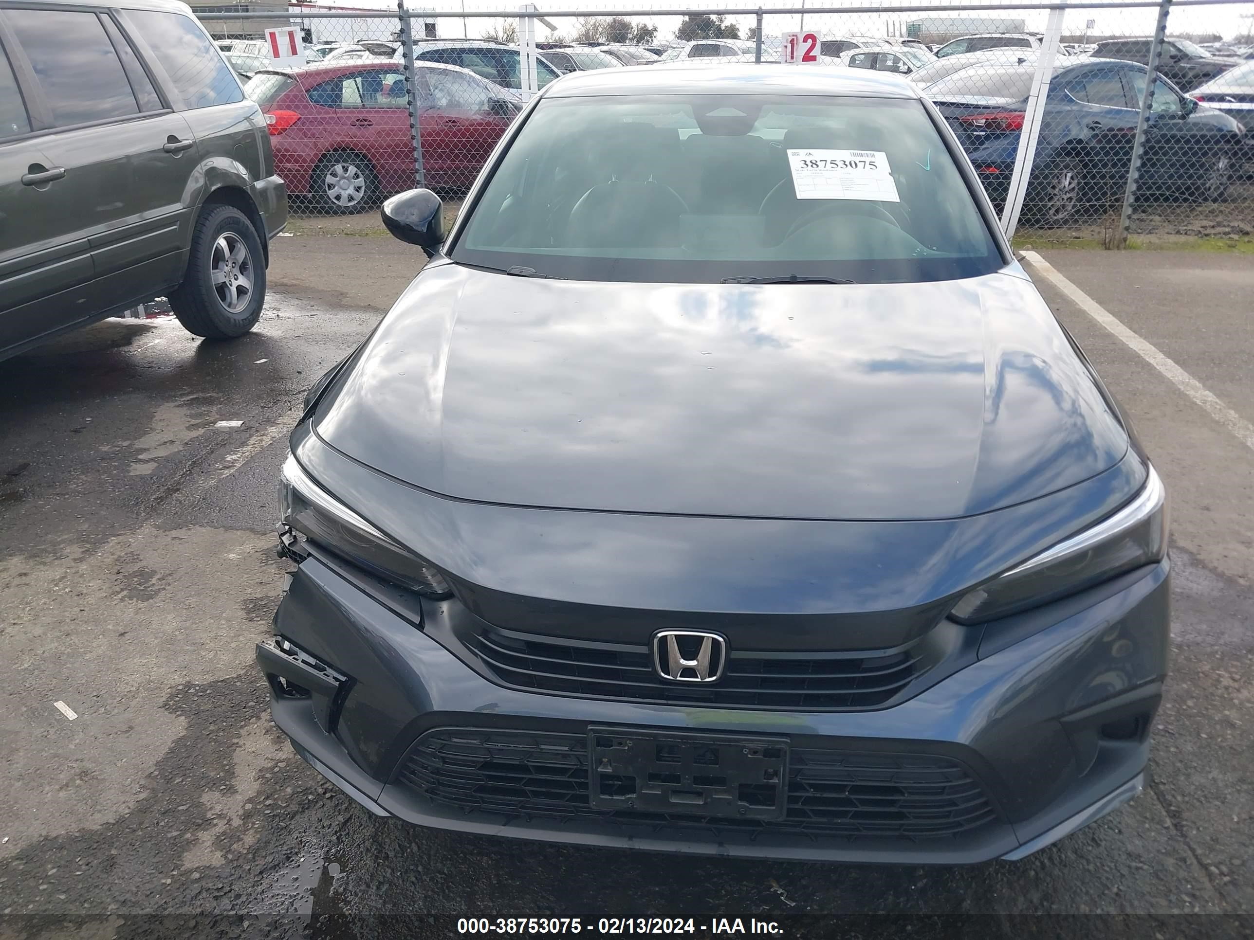 Photo 11 VIN: 2HGFE2F5XPH536231 - HONDA CIVIC 