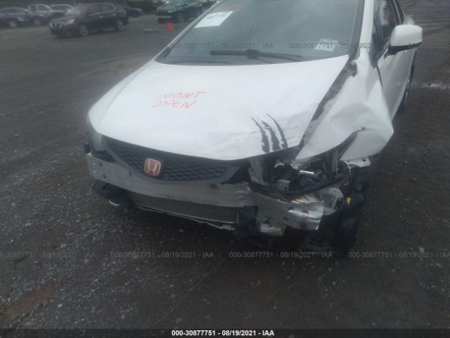 Photo 5 VIN: 2HGFG3B09CH525077 - HONDA CIVIC CPE 