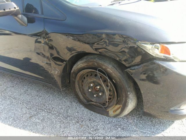 Photo 5 VIN: 2HGFG3B51DH508318 - HONDA CIVIC CPE 