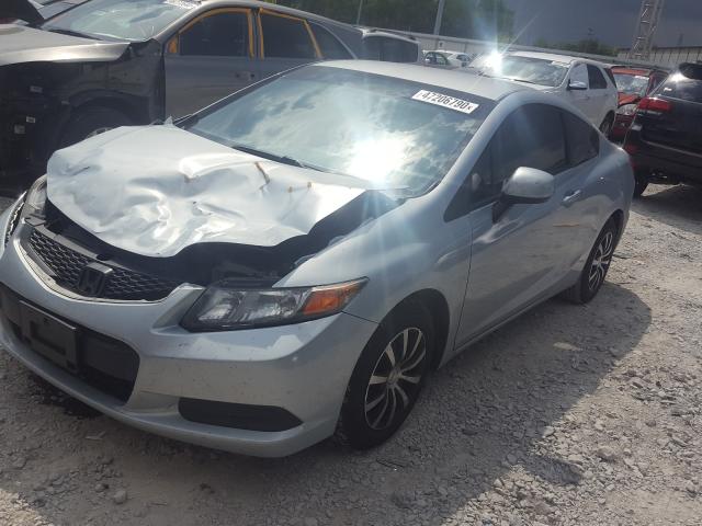 Photo 1 VIN: 2HGFG3B52CH565593 - HONDA CIVIC LX 