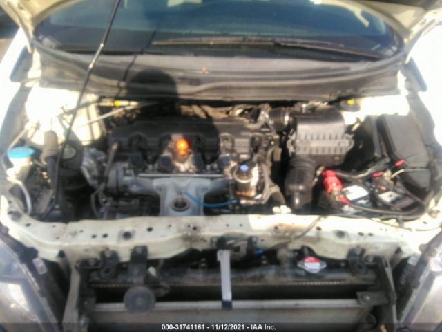 Photo 9 VIN: 2HGFG3B55DH511741 - HONDA CIVIC CPE 