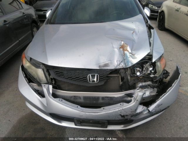 Photo 9 VIN: 2HGFG3B5XCH515671 - HONDA CIVIC CPE 