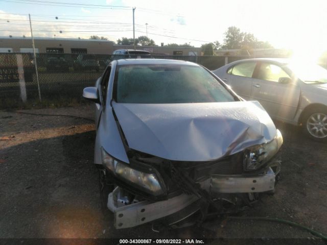 Photo 5 VIN: 2HGFG3B80DH511205 - HONDA CIVIC CPE 