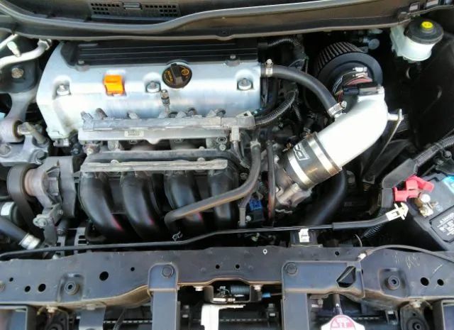 Photo 9 VIN: 2HGFG4A54DH706978 - HONDA CIVIC CPE 