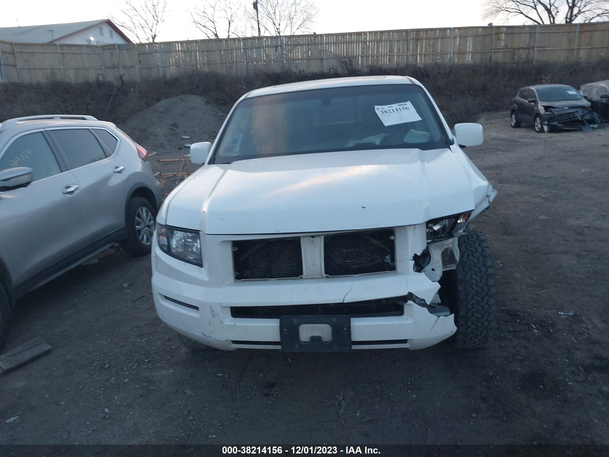 Photo 11 VIN: 2HJYK16518H513279 - HONDA RIDGELINE 