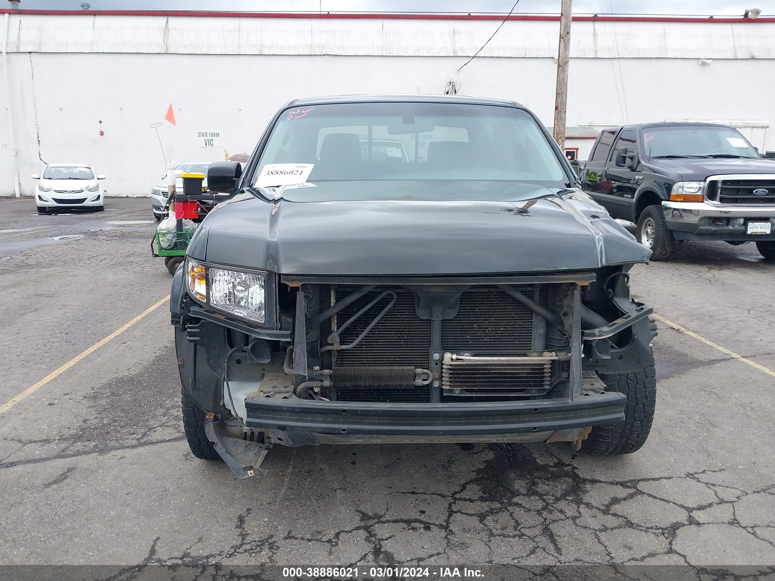 Photo 12 VIN: 2HJYK16557H509718 - HONDA RIDGELINE 