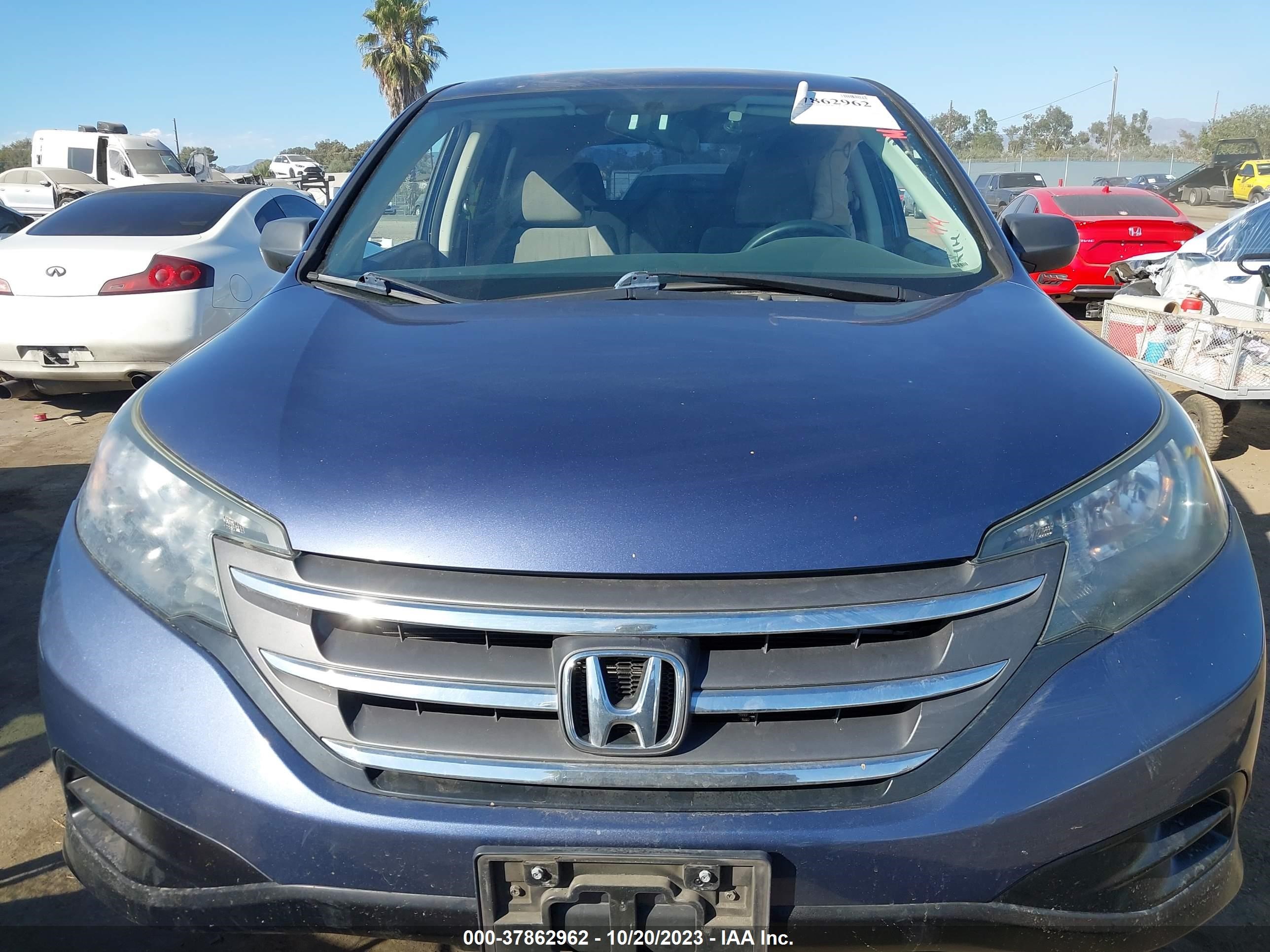 Photo 11 VIN: 2HKRM3H30EH503579 - HONDA CR-V 