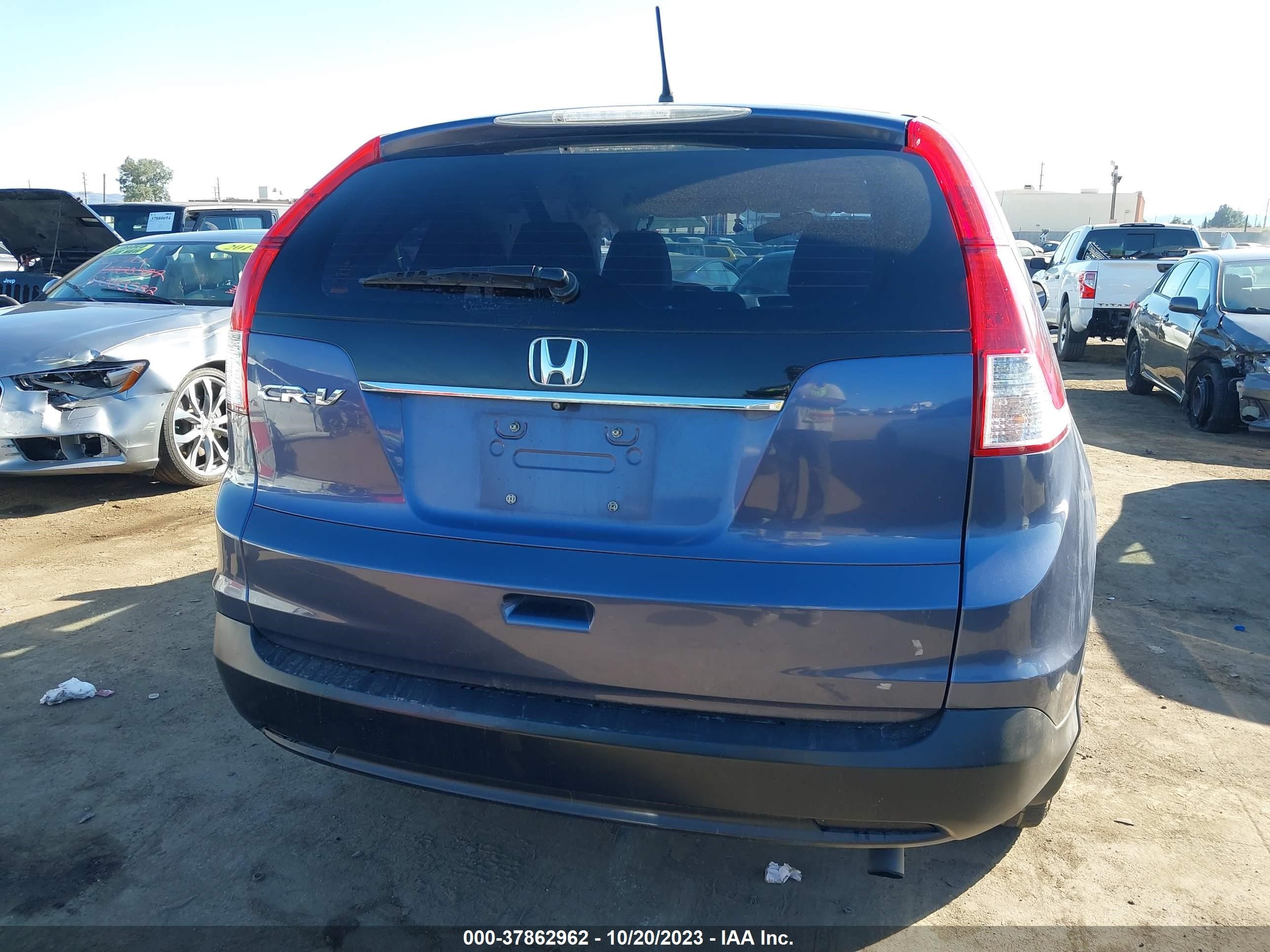 Photo 15 VIN: 2HKRM3H30EH503579 - HONDA CR-V 