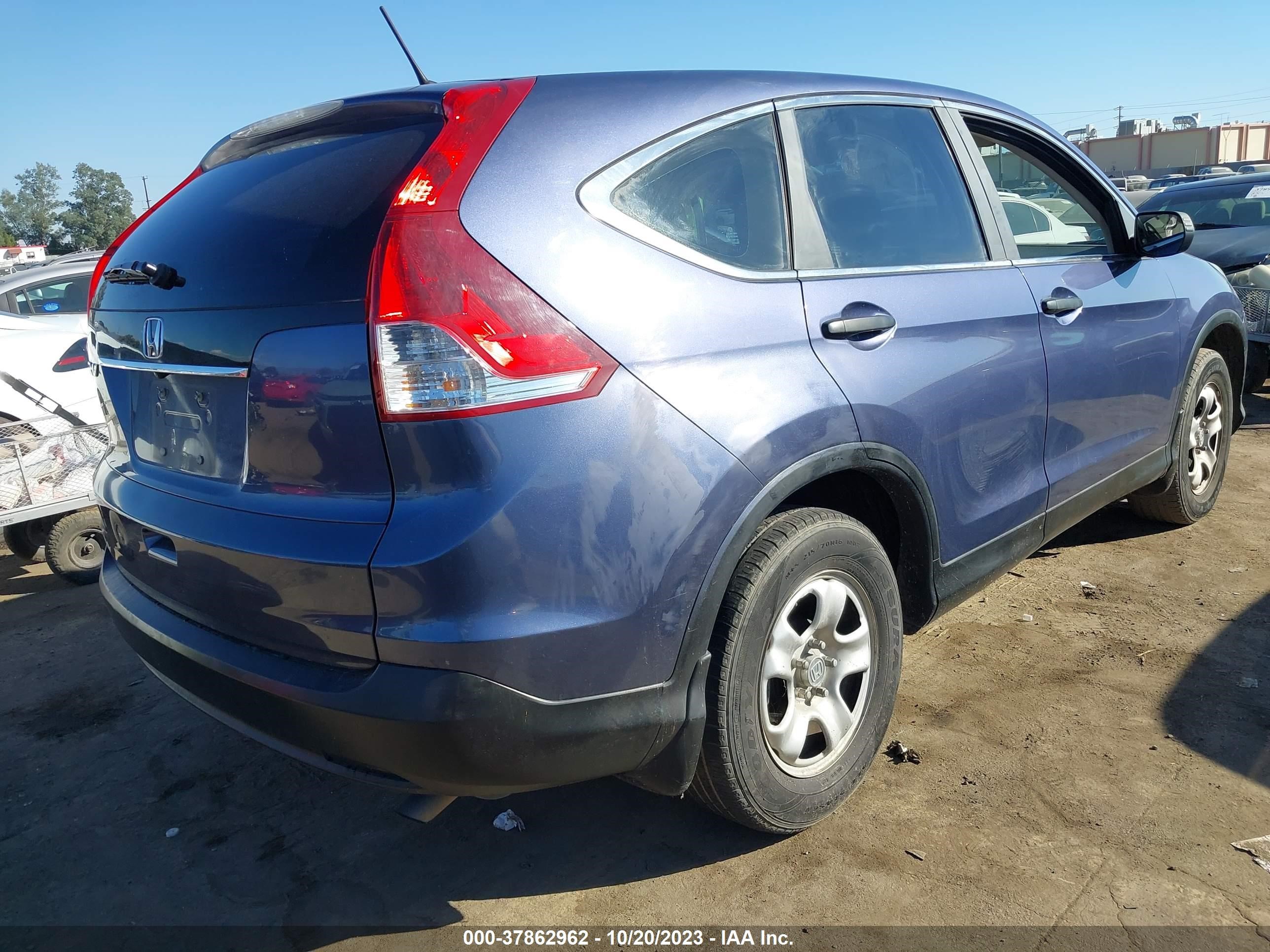 Photo 3 VIN: 2HKRM3H30EH503579 - HONDA CR-V 