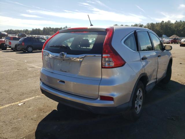 Photo 3 VIN: 2HKRM3H30GH561713 - HONDA CR-V LX 