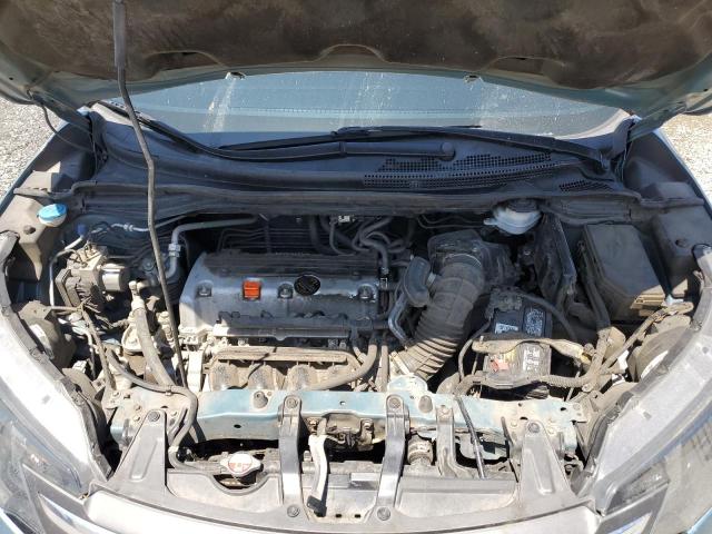 Photo 11 VIN: 2HKRM3H31EH514008 - HONDA CRV 