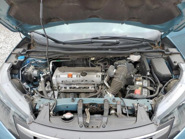 Photo 11 VIN: 2HKRM3H32EH560348 - HONDA CR-V LX 