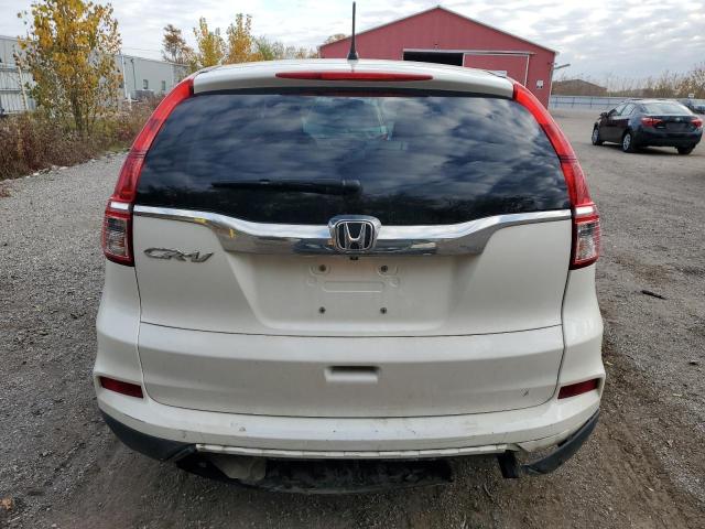 Photo 5 VIN: 2HKRM3H32FH002484 - HONDA CR-V LX 