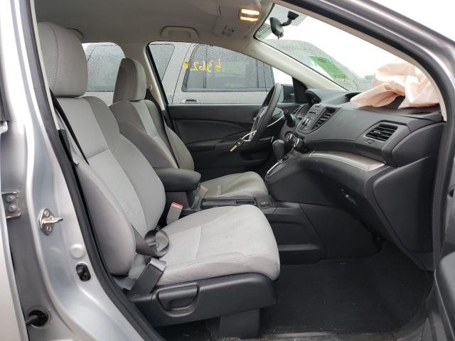 Photo 4 VIN: 2HKRM3H32GH539275 - HONDA CR-V LX 