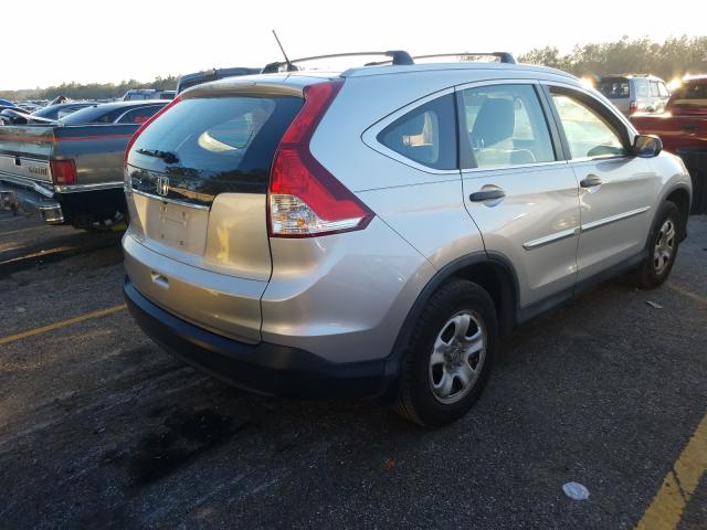 Photo 3 VIN: 2HKRM3H33EH510963 - HONDA CR-V LX 