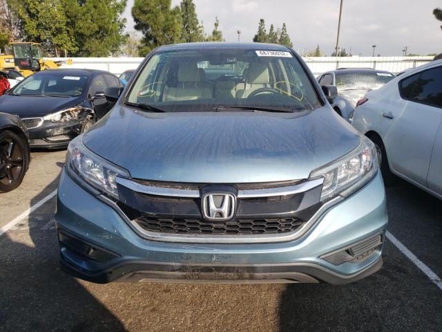 Photo 4 VIN: 2HKRM3H33FH556309 - HONDA CR-V LX 