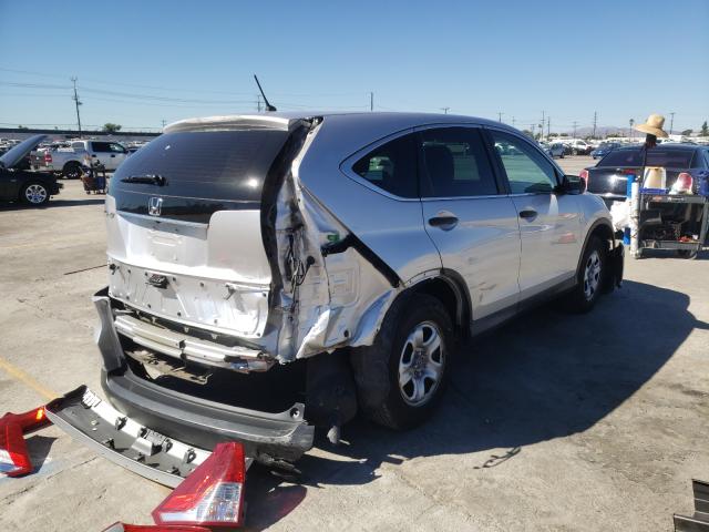 Photo 3 VIN: 2HKRM3H34EH548718 - HONDA CR-V LX 