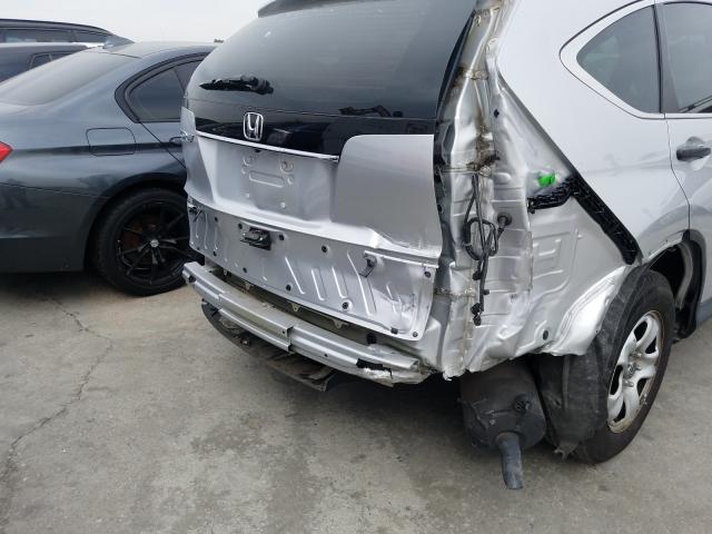 Photo 9 VIN: 2HKRM3H34EH548718 - HONDA CR-V LX 