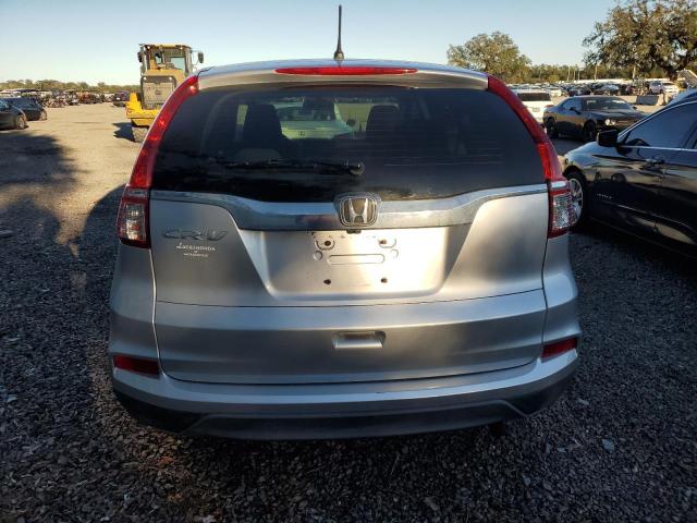 Photo 5 VIN: 2HKRM3H34FH557825 - HONDA CR-V LX 