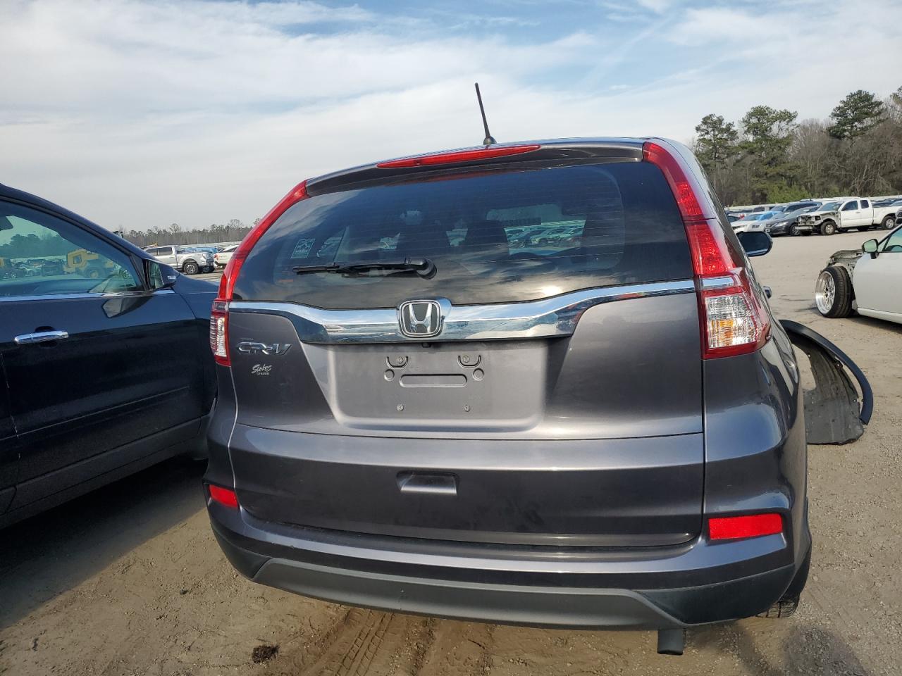 Photo 5 VIN: 2HKRM3H34GH520971 - HONDA CR-V 