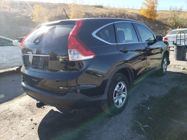 Photo 3 VIN: 2HKRM3H36DH504931 - HONDA CR-V LX 