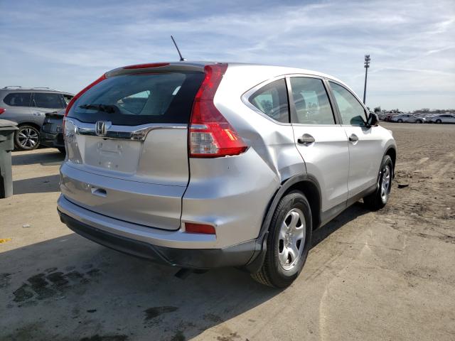 Photo 3 VIN: 2HKRM3H37GH560543 - HONDA CR-V LX 