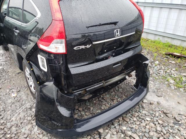 Photo 8 VIN: 2HKRM3H39EH002156 - HONDA CR-V LX 