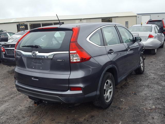 Photo 3 VIN: 2HKRM3H39FH557755 - HONDA CR-V LX 