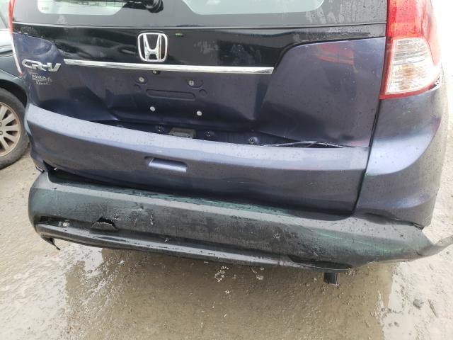 Photo 8 VIN: 2HKRM3H3XEH504660 - HONDA CR-V LX 