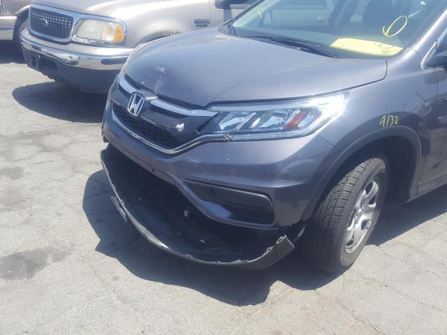 Photo 8 VIN: 2HKRM3H3XFH504238 - HONDA CR-V LX 