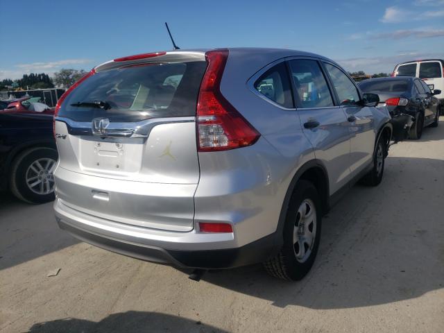 Photo 3 VIN: 2HKRM3H3XGH512518 - HONDA CR-V LX 