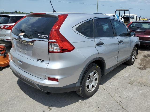 Photo 3 VIN: 2HKRM3H3XGH521770 - HONDA CR-V LX 