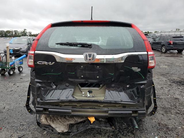 Photo 5 VIN: 2HKRM3H3XGH552629 - HONDA CR-V LX 