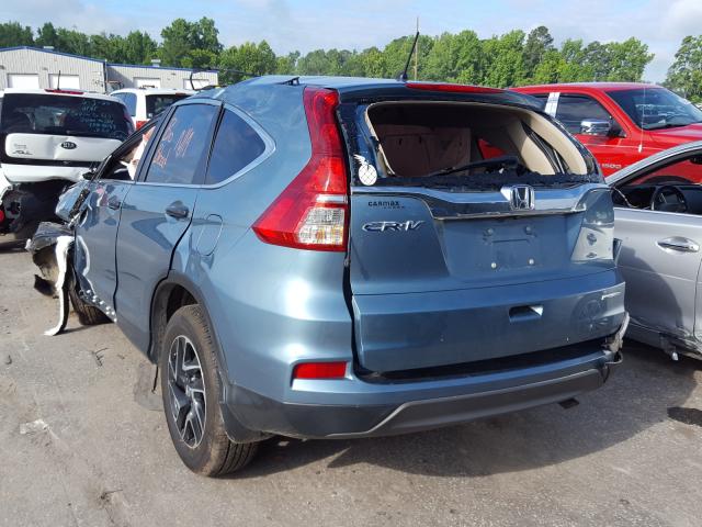 Photo 2 VIN: 2HKRM3H41GH562006 - HONDA CR-V SE 