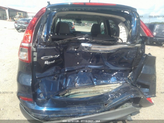 Photo 5 VIN: 2HKRM3H41GH562703 - HONDA CR-V 