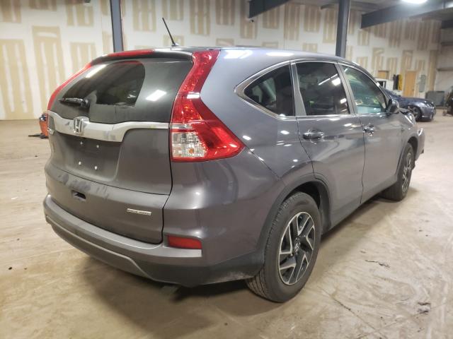 Photo 3 VIN: 2HKRM3H41GH569263 - HONDA CR-V SE 