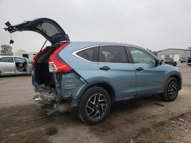 Photo 3 VIN: 2HKRM3H41GH569618 - HONDA CR-V SE 