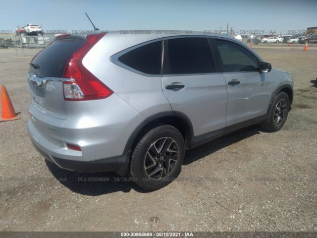 Photo 3 VIN: 2HKRM3H44GH525953 - HONDA CR-V 