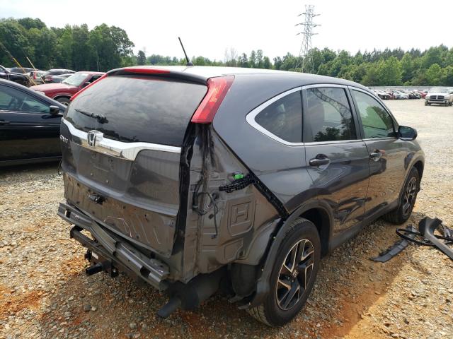 Photo 3 VIN: 2HKRM3H45GH539327 - HONDA CR-V SE 