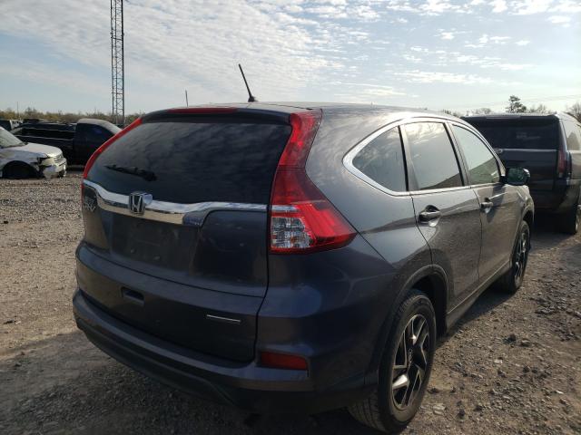 Photo 3 VIN: 2HKRM3H49GH531828 - HONDA CR-V SE 